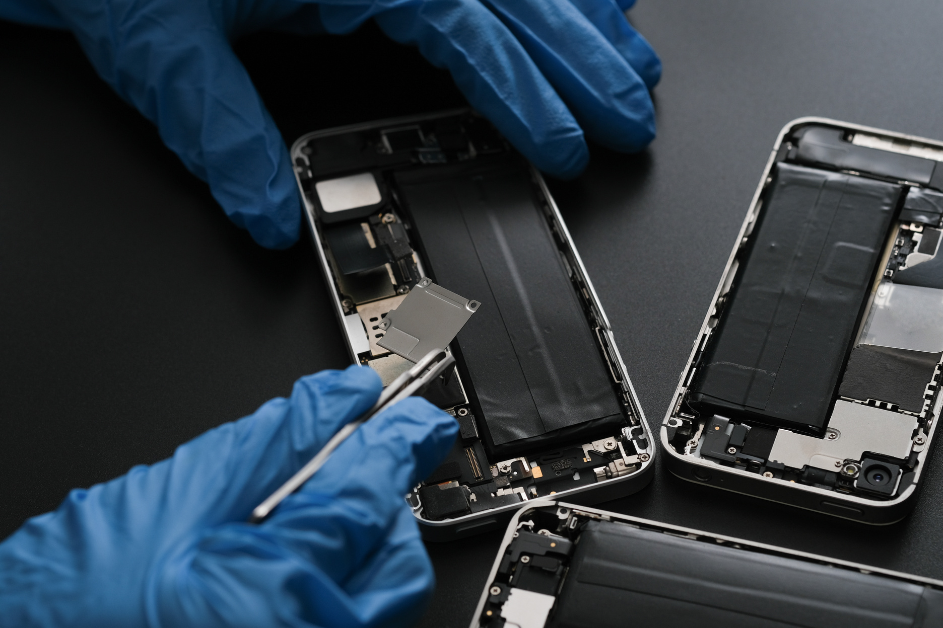 Technician repairing the Cell phone parts and tools for recovery repair phone smartphone